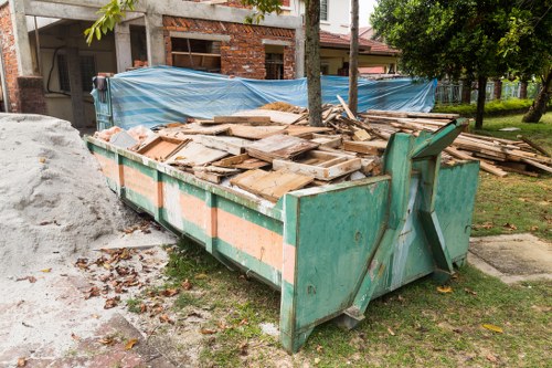 Commercial waste removal team in action in Shadwell
